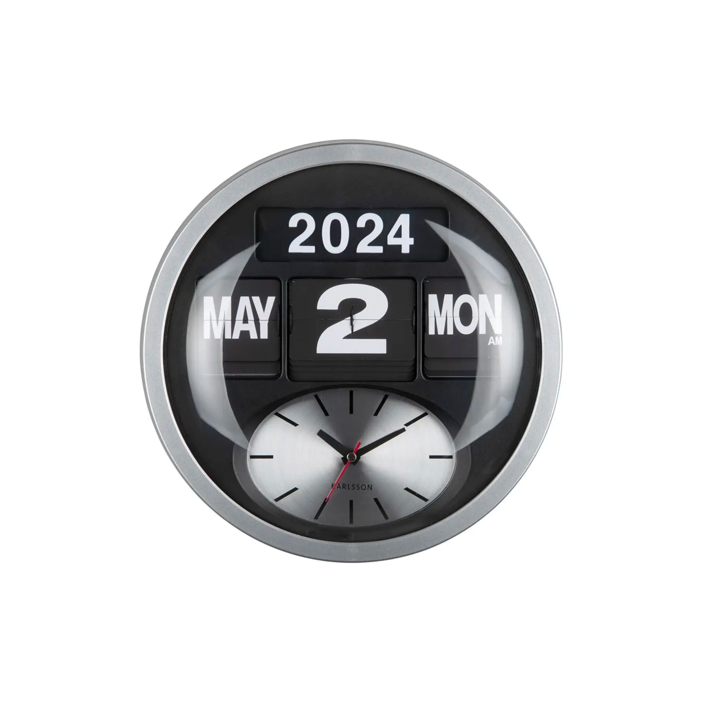 Nahansicht: runde Wanduhr Silber mit schwarzem Kalender-Flip und Analoguhr mit Zeigern