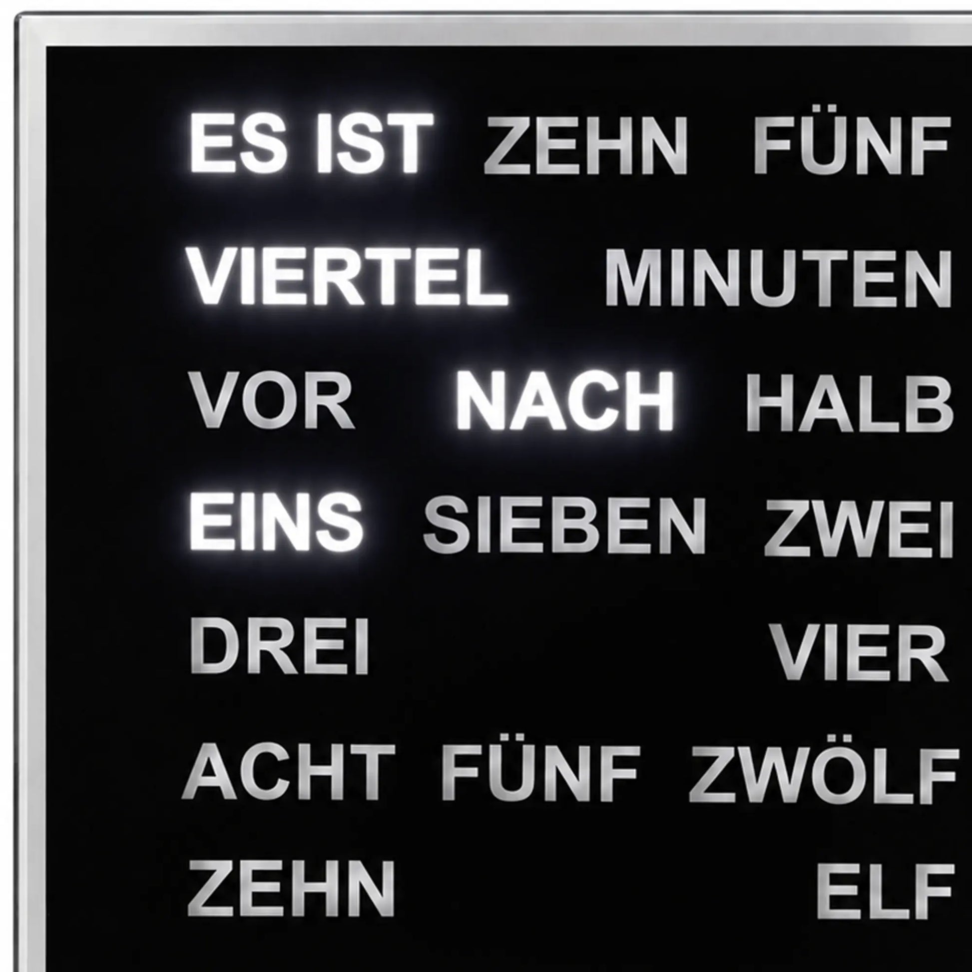 LED-Anzeige der Wanduhr mit Wortziffern auf schwarzem Bildschirm