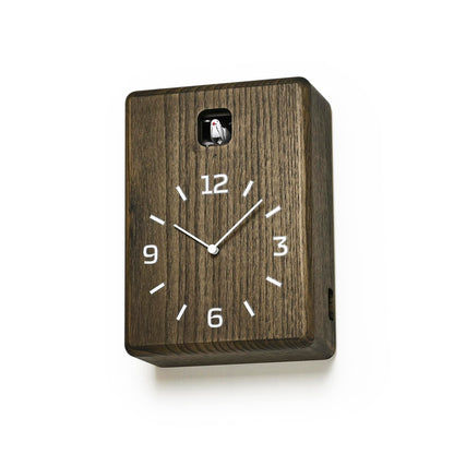 Wanduhr dunkelbraun aus Holz mit Analogziffern und kleinem Aufsatz oben