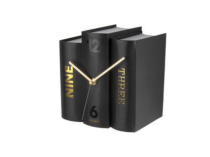 Tischuhr im Bücherdesign, schwarzes Papiergehäuse und goldene Zeiger