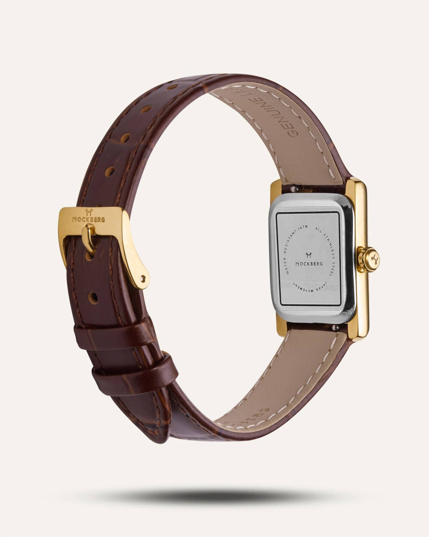 Rückseite einer Damenarmbanduhr mit braunem Lederband und vergoldetem Gehäuse