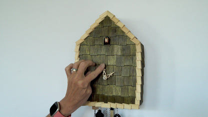 Rombach & Haas Schindel RE34S-4 Wall Clock Green/Natural • Mechanical 8-Day Movement • Hand-Carved Wooden Bird
