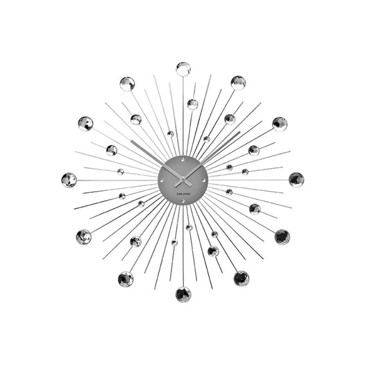 Silberne Sonnenstrahl-Wanduhr mit runder Uhrscheibe und glänzenden Kristallkugeln.