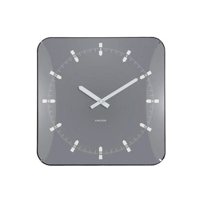 Quadratische Wanduhr grau mit weißen Zeigern und Strichindizes, klare Glaskante