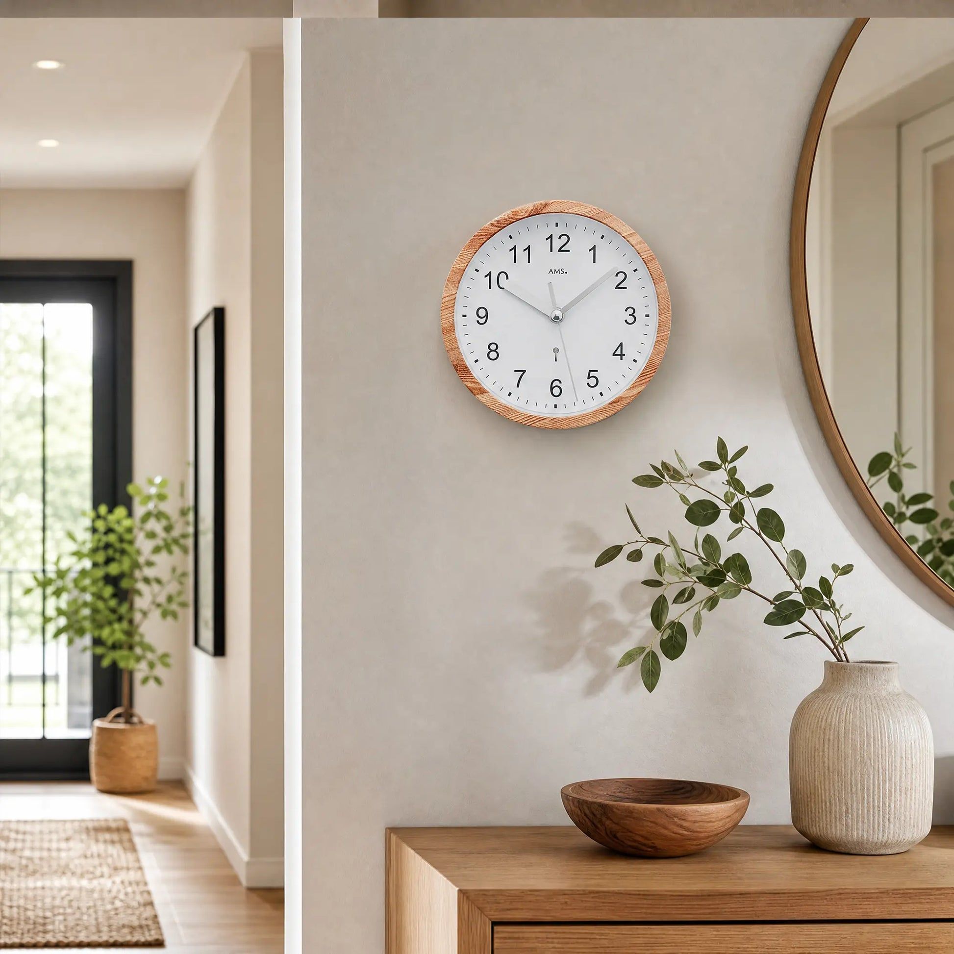 Wall clock with wood-look frame, white dial, and black numbers
