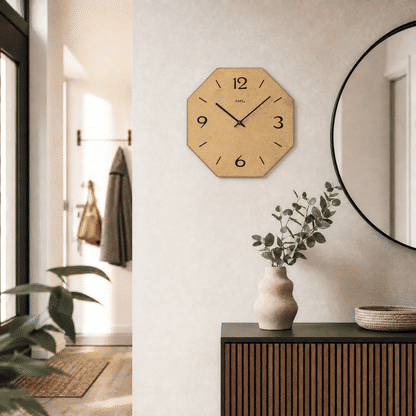Wall clock: octagonal wooden case, beige dial with black numbers and hands.