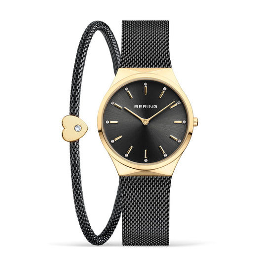 Bering Damenuhr mit goldfarbenem Gehäuse, schwarzem Zifferblatt und Milanaise-Armband