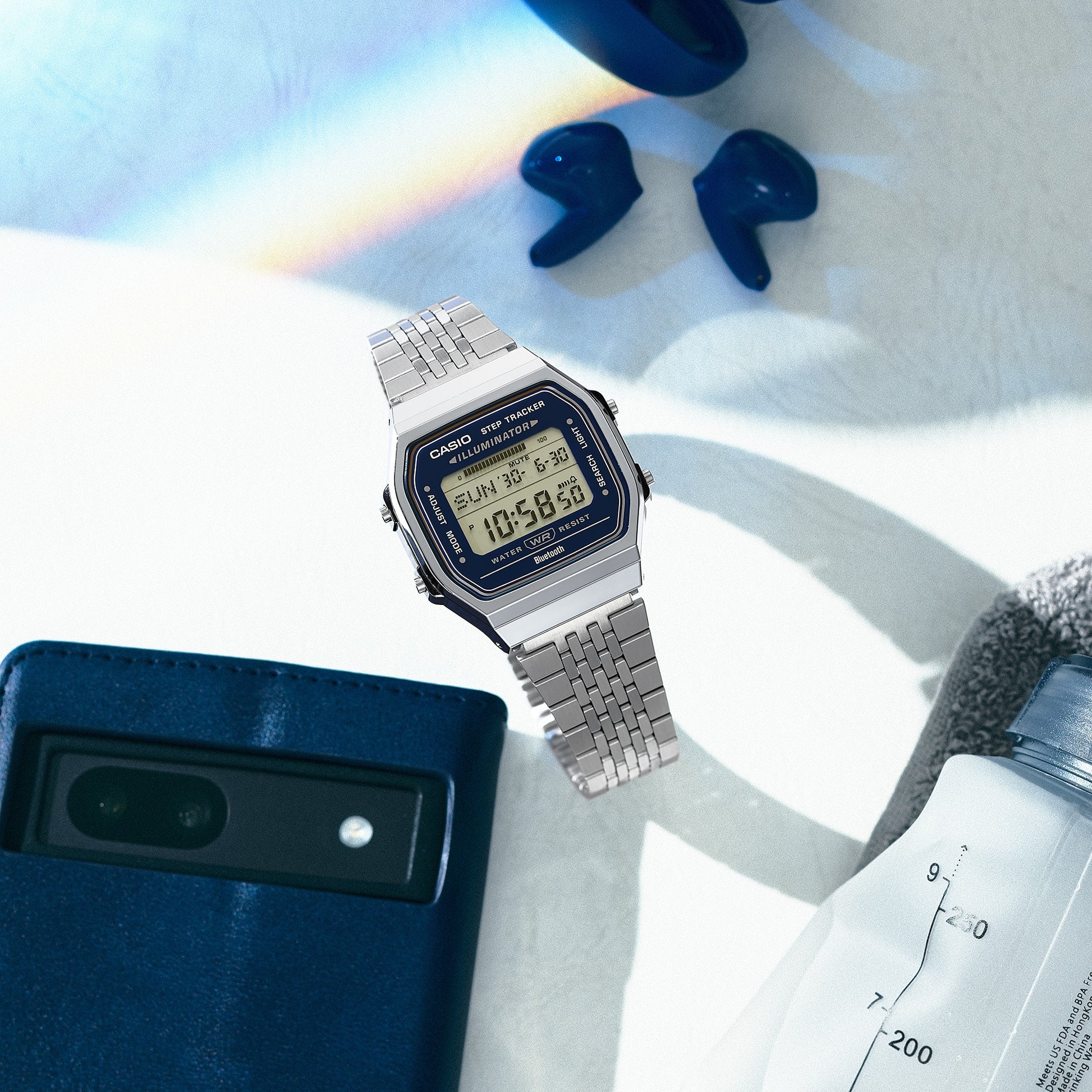 Casio Vintage ABL-100WE-2AEF Armbanduhr mit silbernem Metallband und blauem Display