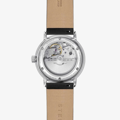 Unisex-Automatikuhr mit sichtbarem Uhrwerk, beigem Lederarmband und silbernem Gehäuse