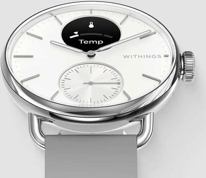 Hybrydowy smartwatch Withings z białą tarczą, czarnym wskaźnikiem temperatury i szarym paskiem