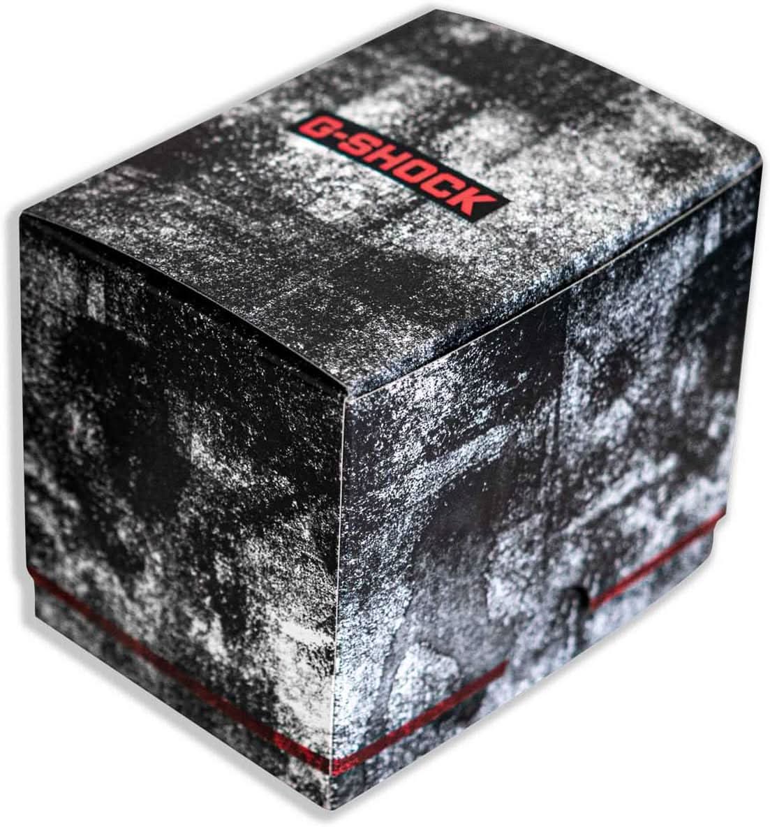 Pudełko na zegarek z logo G-SHOCK, czarno-biała wzorzysta powierzchnia