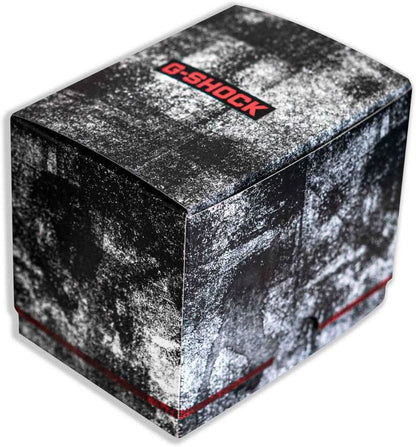 Pudełko na zegarek z logo G-SHOCK, czarno-biała wzorzysta powierzchnia