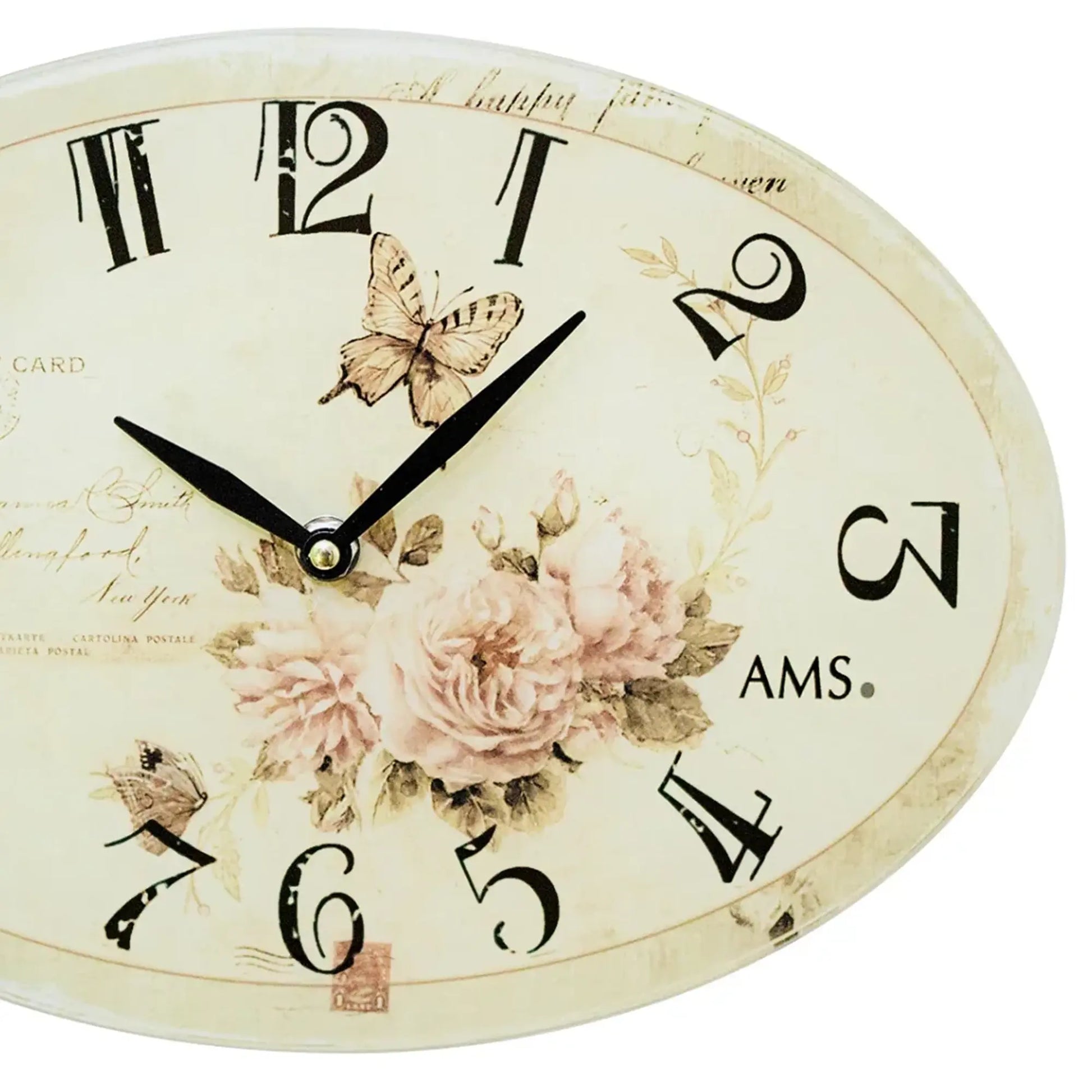 Runde Wanduhr mit klarem Glas, cremefarbenes Zifferblatt mit Blumen und schwarzen Zeigern